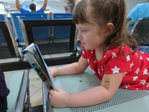 Emerson planning the rest of our day while awaiting the ferry in Batam...